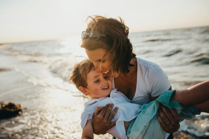 Image of a Mother and Child. Photo by Xavier Mouton. Used under license by unsplash.com