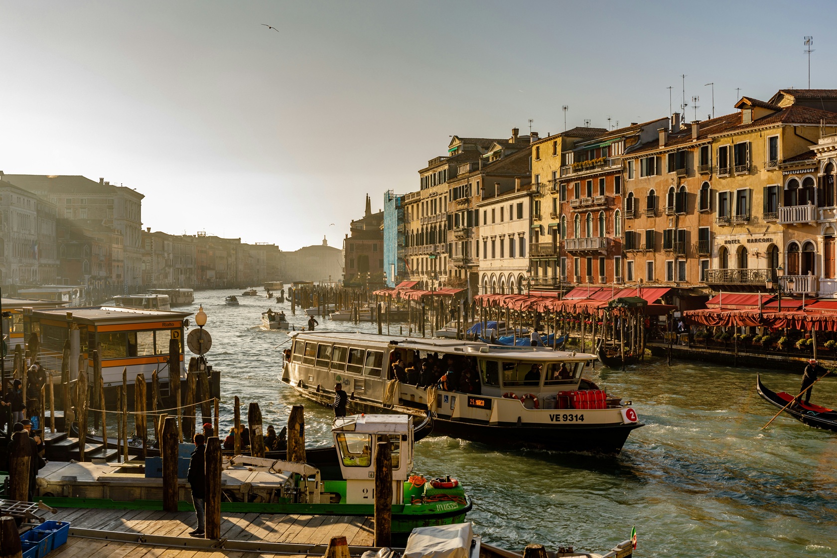 Image of Vaparetto leaving dock, Venice, Italy by Henri Picot under license by Unsplash.com